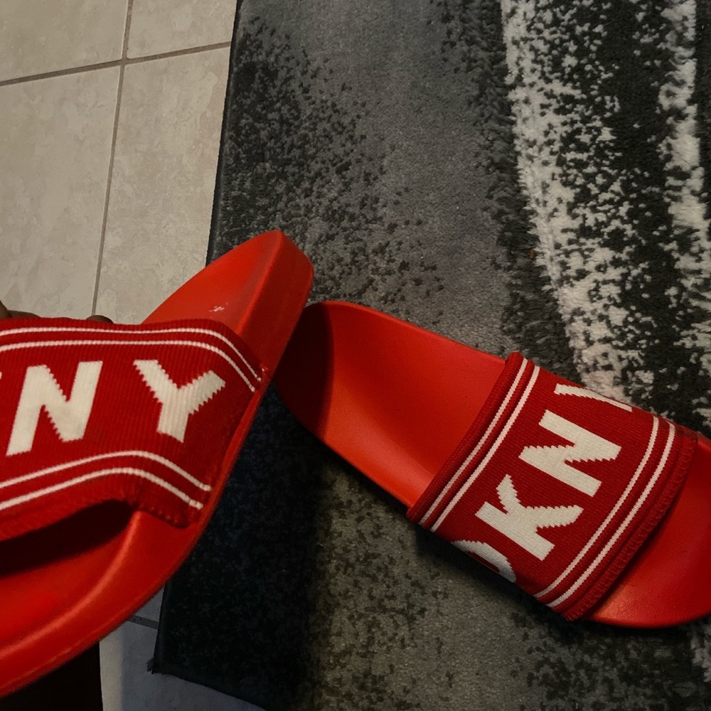Red DKNY slides